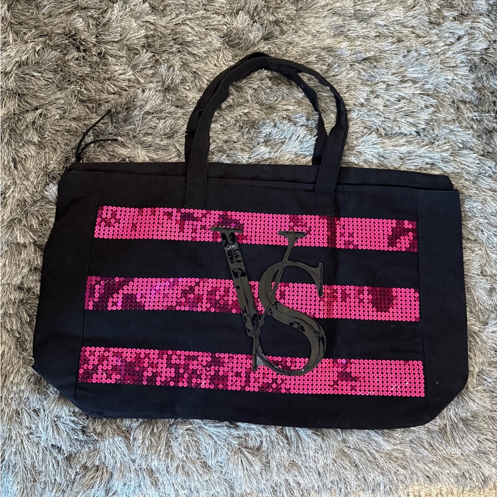 Victoria’s Secrets black and pink sequins tote bag
23” x 12” x 6